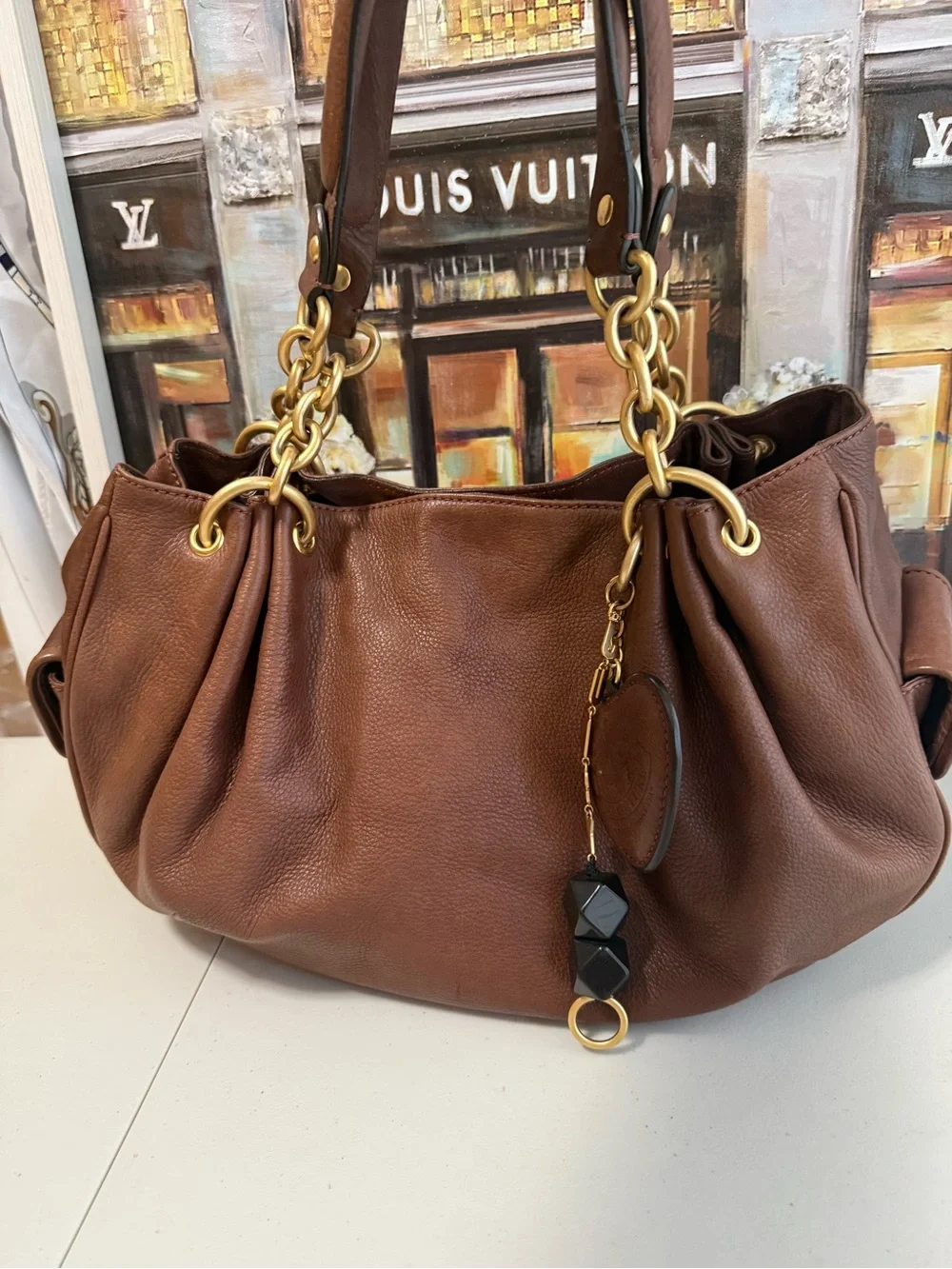 Juicy Couture Brown Leather Shoulder Bag with Gold Chain Accents
